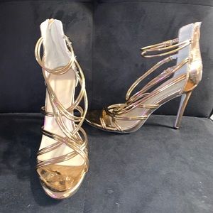 Gold strapped heels